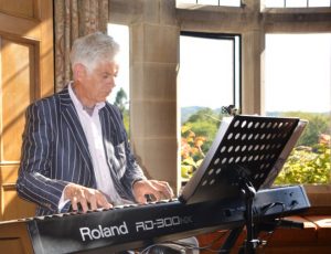 Chris playing piano