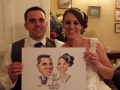 Colour caricature of bride and groom for guests to sign