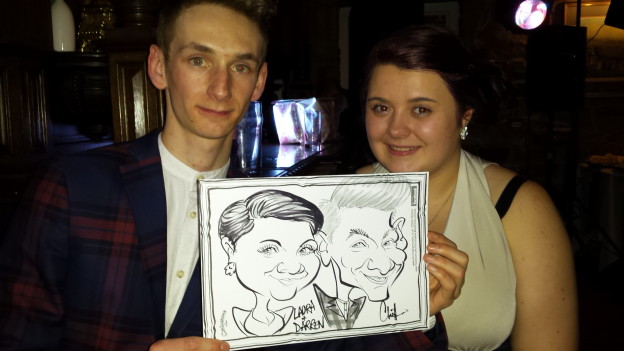 Wedding guests with their caricature