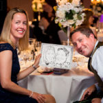 Guests with their caricature.
